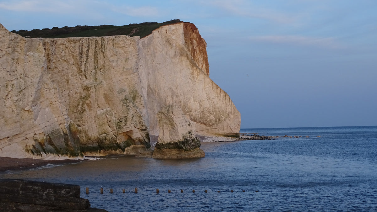 White chalk cliffs above the sea on the Sussex coast – original coastal photograph by Sharon Maskery